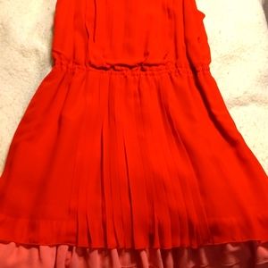 Red dress with pink detail.